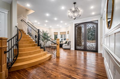 Entrance of a senior living facility with a staircase