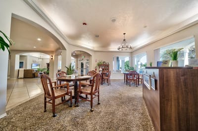 Interior view of a common area with tables and chairs