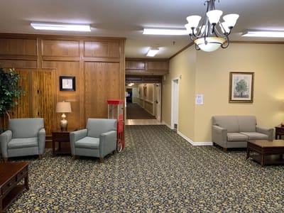 Bright common area with seating and decor