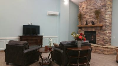 Cozy common area with seating and fireplace