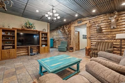 Cozy common area with wooden decor and comfortable seating