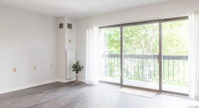 Bright, clean interior space with access to outdoor view