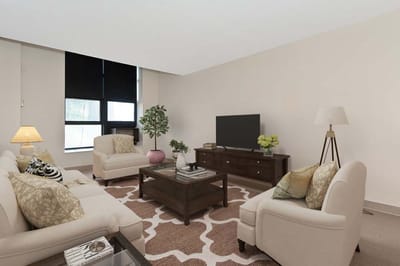 Bright and cozy common area with seating and decor