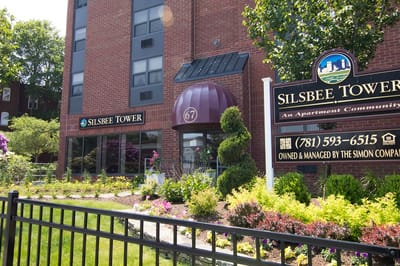 Exterior view of Silsbee Tower with landscaping.