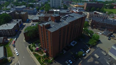 Aerial view of a multi-story senior living facility