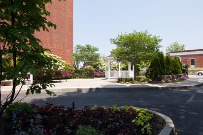 Outdoor space with a gazebo and landscaped area