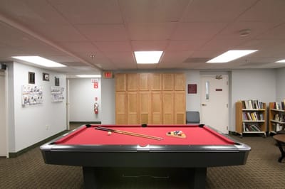 Interior view of a pool table in a recreation room