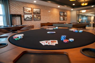 Poker table set up for a game in a common area