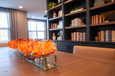 Interior view of a cozy common area with flowers