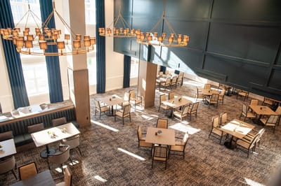 Bright dining room with tables and chairs