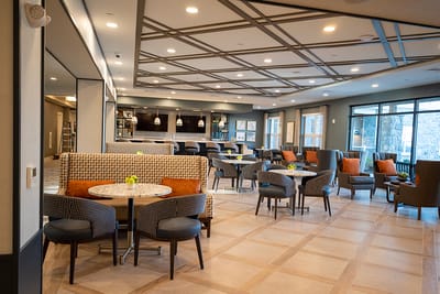 Modern common area with seating and table arrangements