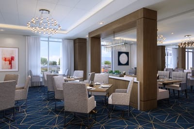 Bright and modern dining room with tables set for meals