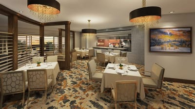 Elegant dining room with white tablecloths and modern decor