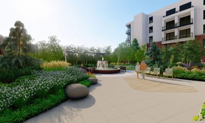 Residents enjoying a landscaped garden area