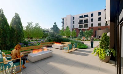Outdoor patio area with fire pits and seating