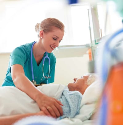 Nurse caring for a senior resident in a facility