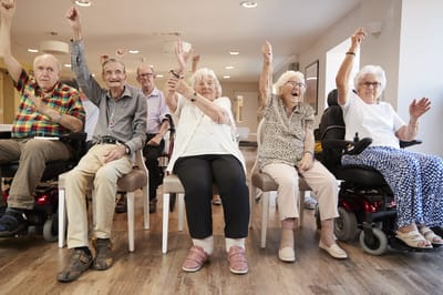 Jenkin`s Living Center, Nursing Home in Watertown, SD — Seniors joyfully participating in a group activity celebration