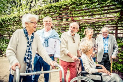 Jenkin`s Living Center, Nursing Home in Watertown, SD — Group of seniors enjoying time outdoors in a garden