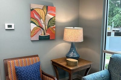 Cozy corner of a facility interior with decor and lighting