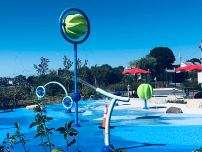Outdoor recreational area with splash park features.