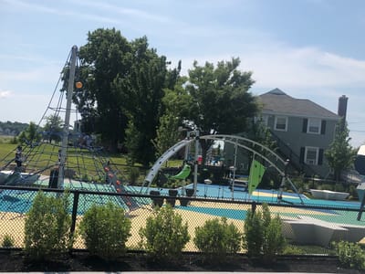 Playground area with climbing structure and seating
