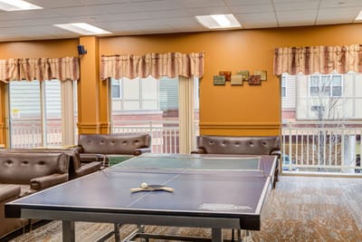 Interior common area with a ping pong table