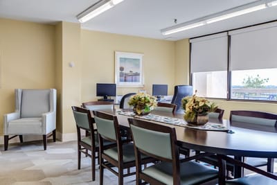 Bright common area with tables and chairs