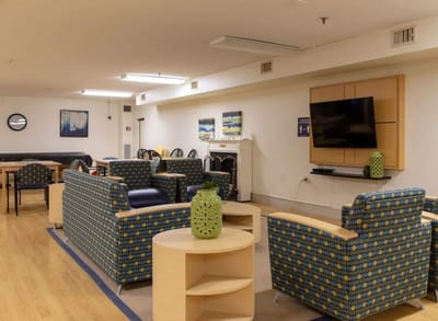 Common area with seating and television