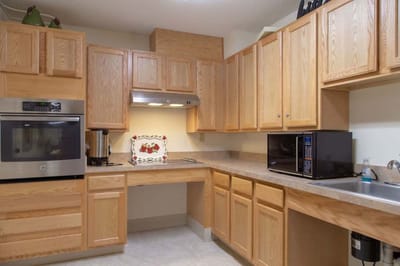 Well-equipped kitchen area in a senior apartment