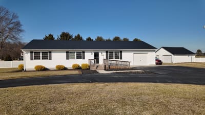 Exterior view of a senior living facility with a driveway
