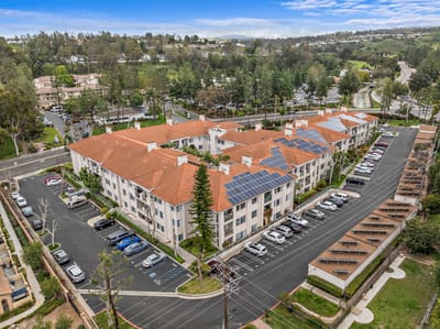 Aerial view of Palacio Senior Apartments with landscaped grounds