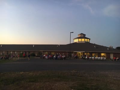Exterior view of assisted living facility during an event