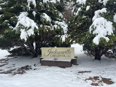 Exterior sign of Jacksonville Care Center, LLC in snow