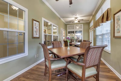 Common area with dining table and chairs