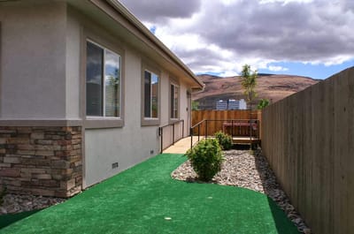 A pathway leading to an outdoor seating area