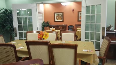 Interior view of the dining area with tables and decorations