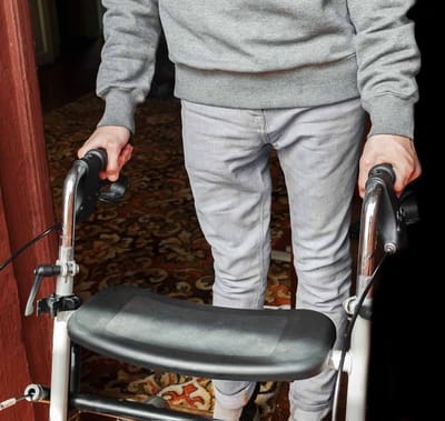 Person using a walker indoors