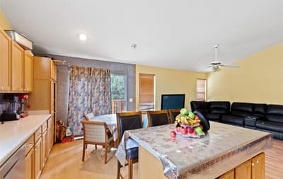 Common area with dining table and a living space
