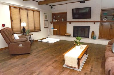 Cozy common area with seating and fireplace