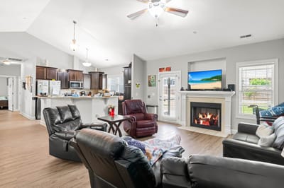 Cozy common area with seating and a fireplace