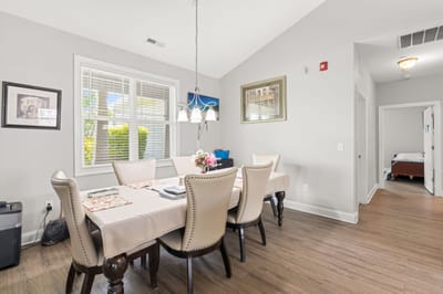 Bright dining room with tables and chairs