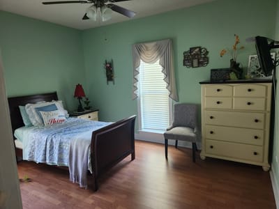 Cozy resident room with natural light and decor