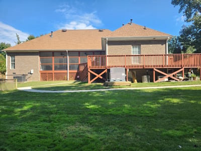 Exterior view of a residential care facility with a deck