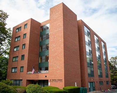 Exterior view of the Water Street Apartments building.