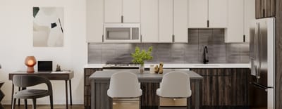 Modern kitchen interior with seating area.