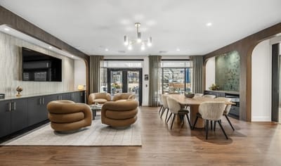 Modern common area with seating and dining layout