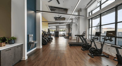 Exercise area with equipment and large windows