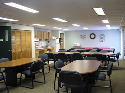 Interior common area with tables and chairs