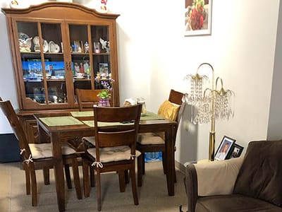 Dining area with wooden table and chairs