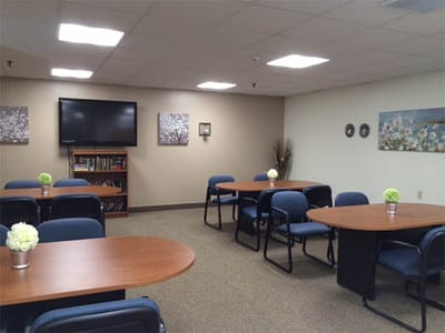 Common area with tables and chairs